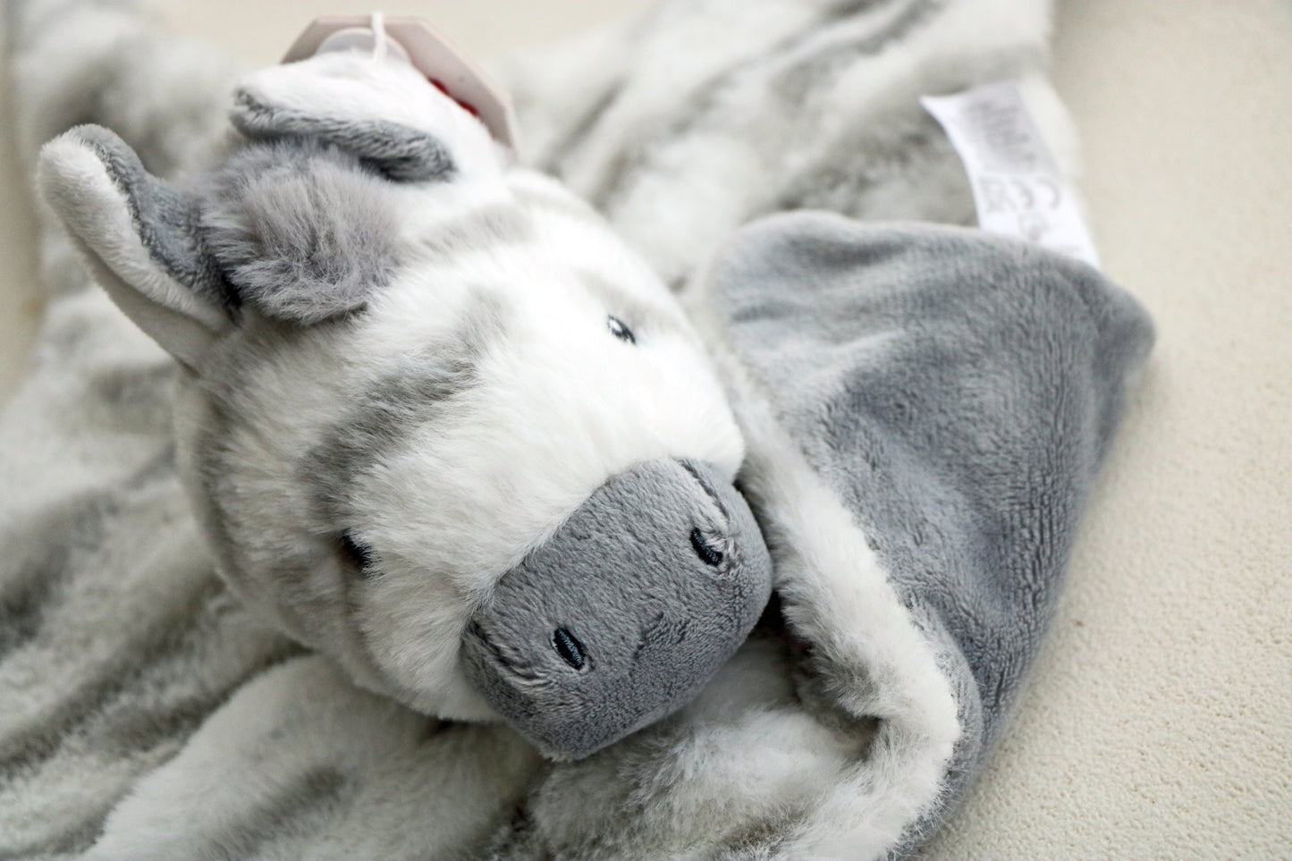 Keeleco Cuddle Zebra Blanket Comforter Baby Zebra Soft Toy Plush on white background close up