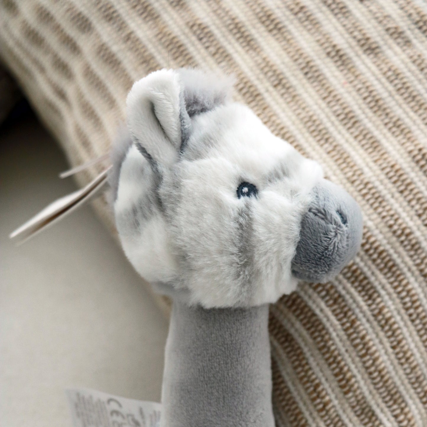 Keeleco Zebra Rattle Stick on white background. Baby rattle toy stick for newborn