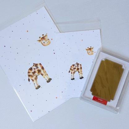 Illustrations of giraffe on A4 and A5 card. With brown clean touch ink pad and space for baby's footprint.