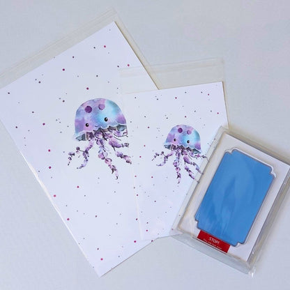 Illustrations of jellyfish on A4 and A5 card. With light blue clean touch ink pad and space for baby's footprints.