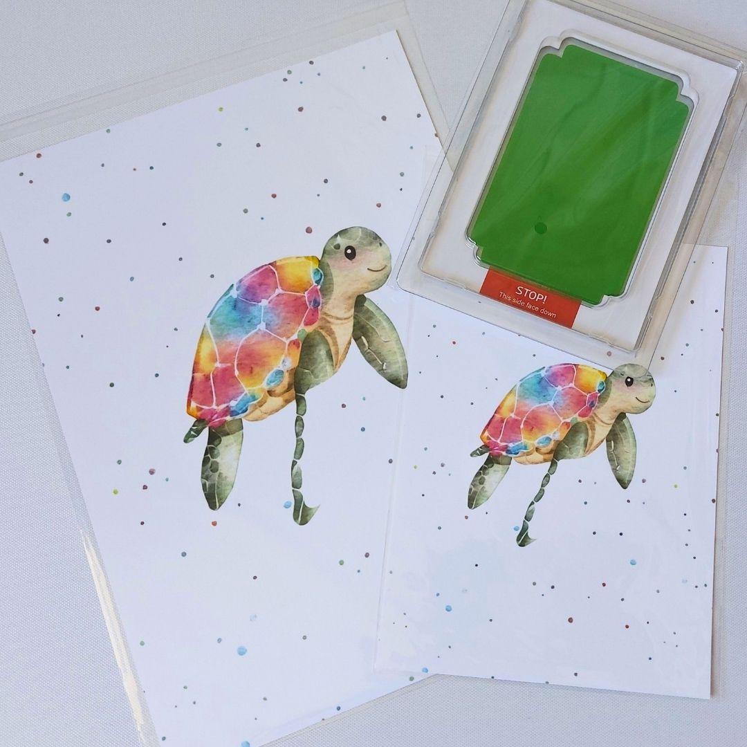 Illustrations of turtle on A4 and A5 card. With dark green clean touch ink pad and space for baby's footprint.