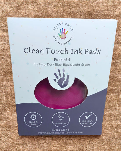 Clean touch ink pads, pack of 4 in cardboard packaging box. Fuchsia, dark blue, black and light green. Quick and easy, mess free, baby safe and non toxic. Extra large size.