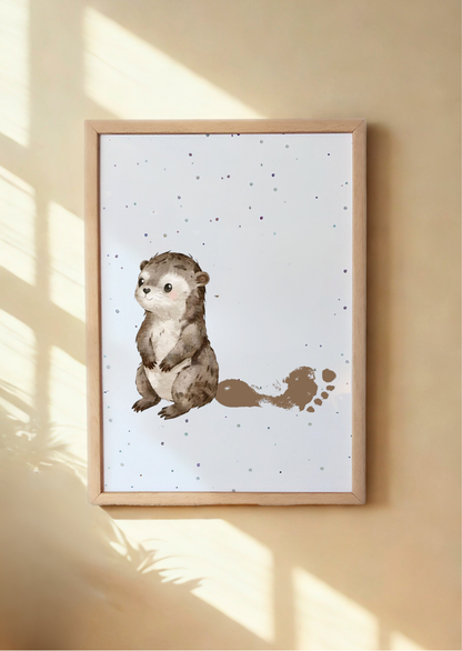 A framed print of otter with child's footprint as its tail