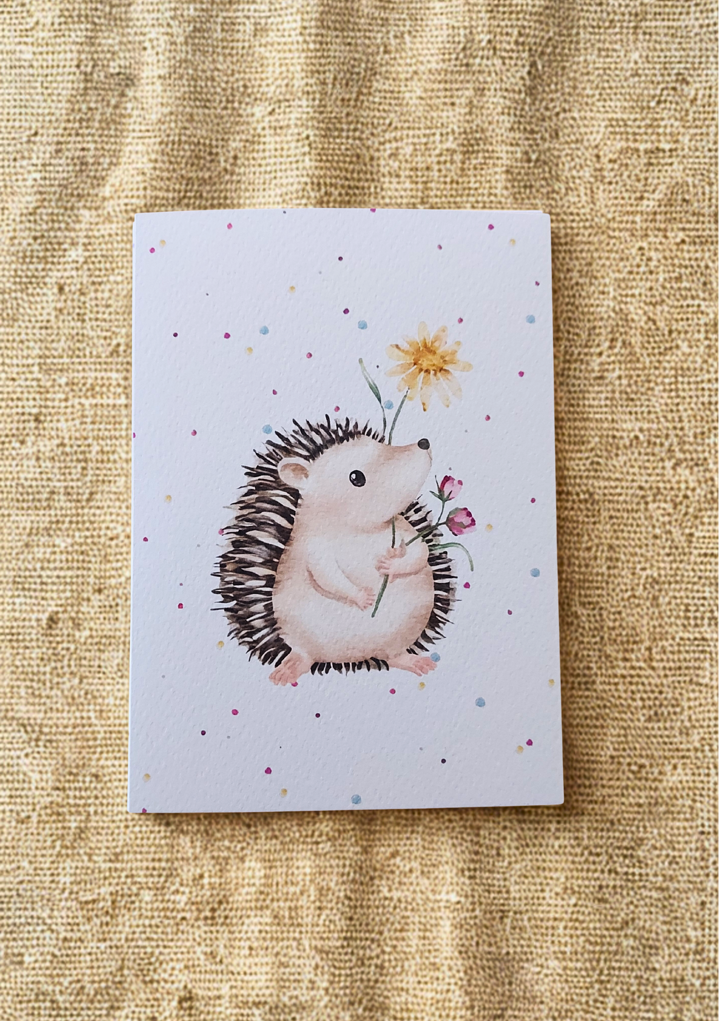 Greetings Card - Watercolour Hedgehog. Blank inside. On plain linen cloth background.