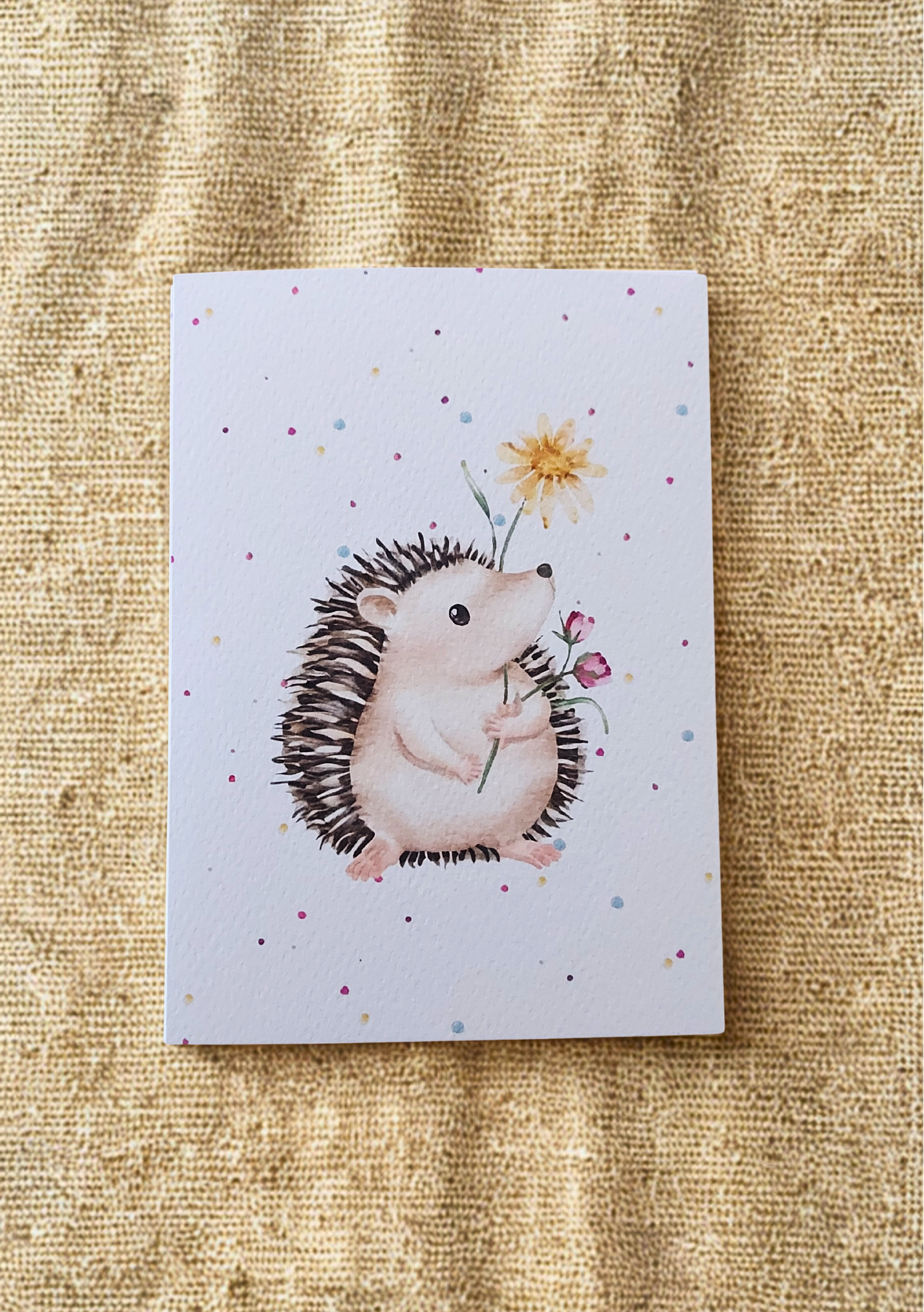 Greetings Card - Watercolour Hedgehog. Blank inside. On plain linen cloth background.