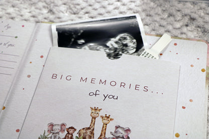 Little Paws Big Memories ABC Animals Keepsake Pocket at back of the book. Baby scan photo and hospital name tag tucked into the keepsake pocket for memories. Text reads 'Big memories of you'