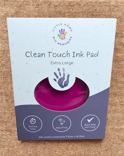 Clean touch ink pad - pink fuchsia in cardboard packaging box. extra large size, quick and easy, mess free, baby safe and non-toxic.