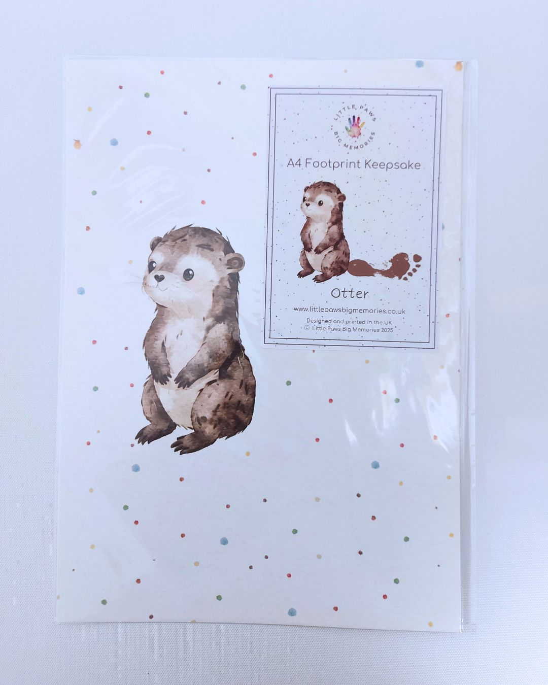 Illustration of an otter on A4 luxury textured card. With space for baby's footprint.