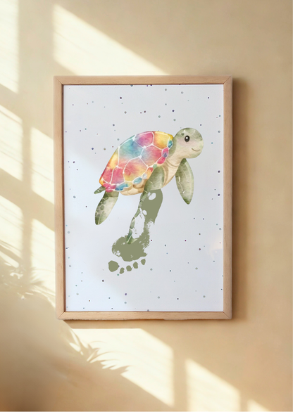 A framed print of turtle with a child's footprint as flipper